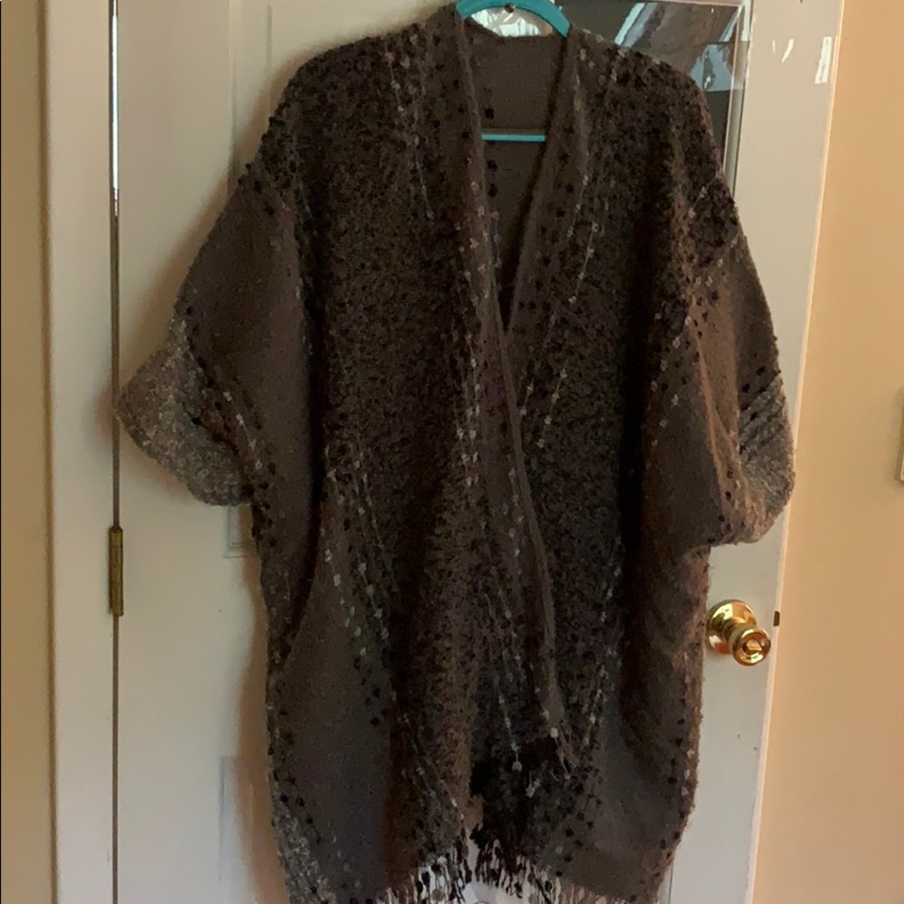 Coat style cape.